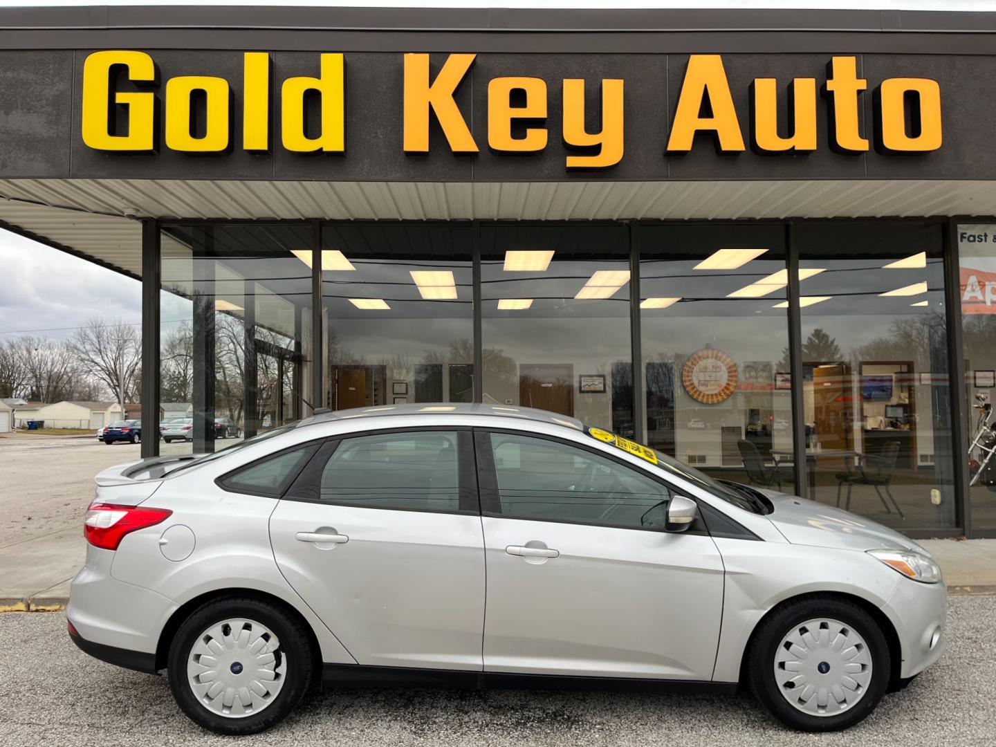 2013 Ingot Silver Metalli Ford Focus SE Sedan (1FADP3F28DL) with an 2.0L L4 DOHC 16V engine, located at 1633 W Kimberly, Davenport, IA, 52806, (563) 323-5341, 41.559456, -90.598732 - Photo#0